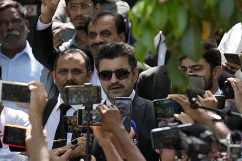 Sher Afzal Khan, a lawyer of Pakistan's former Prime Minister Imran Khan's legal team, talks to media outside the Islamabad High Court in Islamabad, Pakistan, Tuesday, Aug. 29, 2023. 