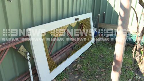 Police say the man ran through the elderly neighbour's front glass door to escape his attackers. Picture: 9NEWS