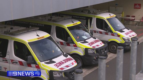 The Victorian Ambulance Union is arguing an Ambulance Victoria (AV) intensive care crew shouldn't have been stuck in a corridor with a non-urgent patient when a man in cardiac arrest needed help.
