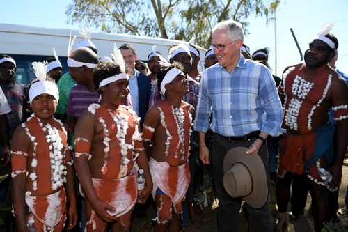 The prime minister was given a special greeting from a local dance troupe after touching down. Picture: AAP