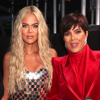 Kim Kardashian West, Khloé Kardashian, and Kris Jenner, winners of The Reality Show of 2021 award for Keeping Up With the Kardashians, pose during the 2021 People's Choice Awards held at Barker Hangar on December 7, 2021 in Santa Monica, California. 