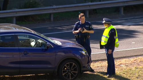 A 71-year-old man was hit and killed by an oncoming car on the M2 Motorway at Baulkham Hills, in Sydney's west, today. Picture: 9NEWS.