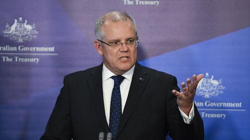 Treasurer Scott Morrison released the latest growth figures today at Parliament House in Canberra. (AAP)