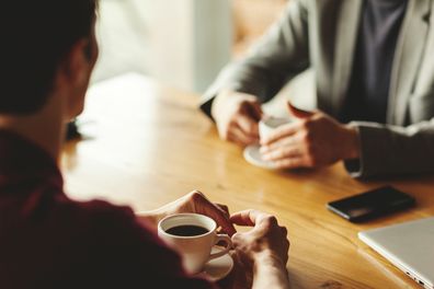 Two men at a cafe