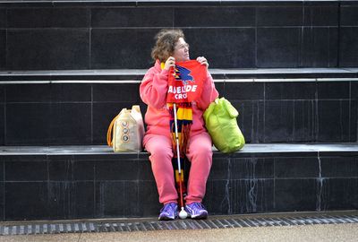 An Adelaide Crows fan shows her support for the late coach.