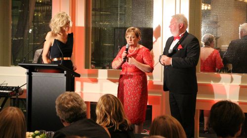 Tara Brown with Denise and Bruce Morcombe onstage.