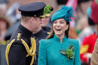 Prince William, Prince of Wales and Catherine, Princess of Wales laughing during the St. Patrick's Day Parade at Mons Barracks on March 17, 2023 in Aldershot, England. 
