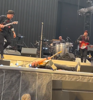Bruce Springsteen falls during Amsterdam concert.