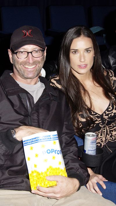 Herb Ritts with Demi Moore and Guy Oseary during Swept Away screening in LA, 2002.
