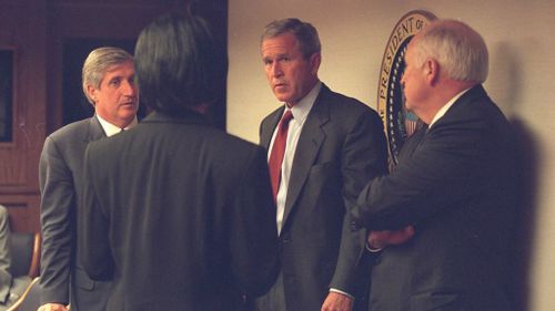 Historic photos show shock and sorrow of Bush administration on day of World Trade Center attacks