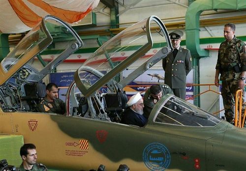 Iran's President Hassan Rouhani sits in the front seat of the Kowsar.