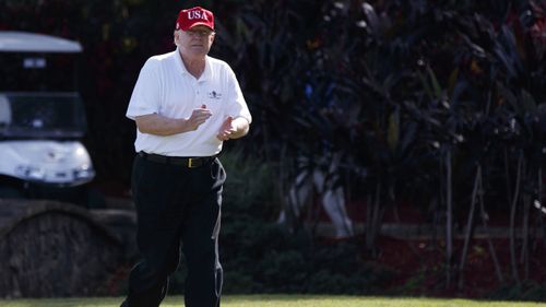 Trump plays golf on Martin Luther King Jr Day