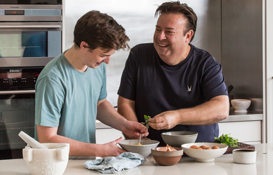 Chef Peter Gilmore cooking with his son