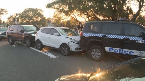 The chase ended after the getaway car was wedged between to police cars.