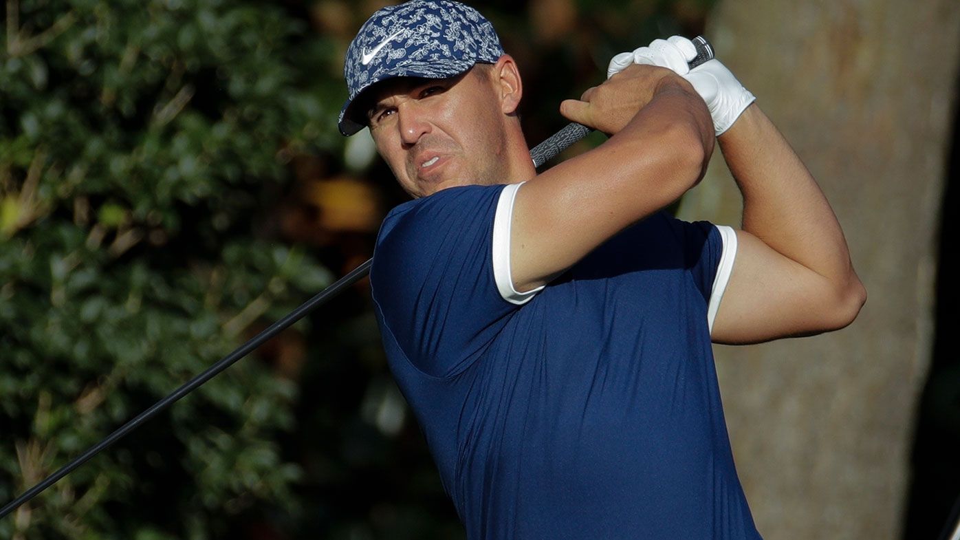 Brooks Koepka shares the first round lead at the Masters.