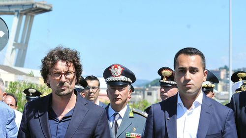 Italian Transport and Infrastructure Minister, Danilo Toninelli, left, and Deputy Premier Luigi Di Maio at the disaster site. 