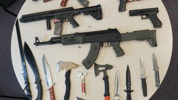 Nearly 20 illegal weapons have been seized from a home in Western Australia by police, including machetes and tasers. 