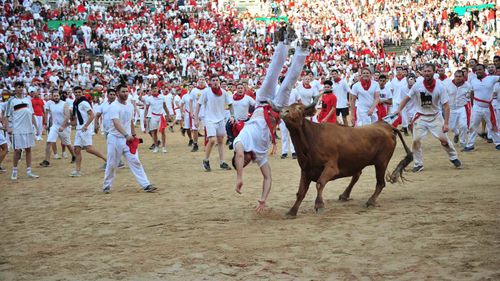 The population of Pamplona quintuples during its annual festival.