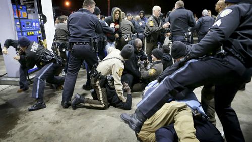 Police clash with protesters in Missouri. (AAP)