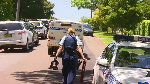 Police collected the machete, a laptop, shoes and a mobile phone as evidence after the crash.