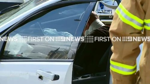 A man in the stolen ute was arrested after spitting at paramedics. (9NEWS)