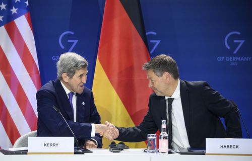 German Economy and Climate Minister Robert Habeck, right, and John Kerry, left, Special Envoy of the U.S. President for Climate, shake hands after they signed a declaration of intent to establish a German-American climate and energy partnership between the United States of America and Germany at the meeting of the G7 Ministers for Climate, Energy and Environment in Berlin, Germany, Friday, May. 27, 2022 