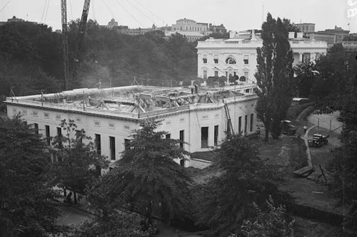 Construction of the West Wing expansion in 1934.