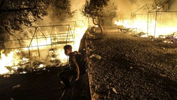 Fire rips through migrant camp in Lesbos, Greece
