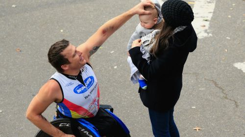 Fearnley celebrates with his family after winning the Pro Pushrim Men's division during the 2014 TCS New York City Marathon in 2014. (Getty)