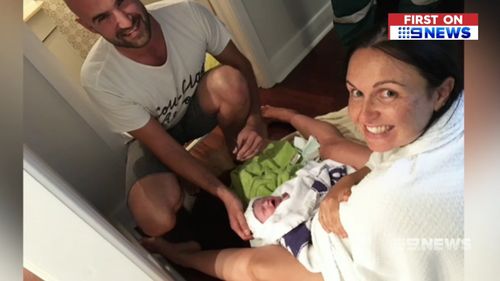 Courtney and PJ Gugusheff weren't expecting to deliver their baby girl on the floor of their family home. Picture: 9NEWS