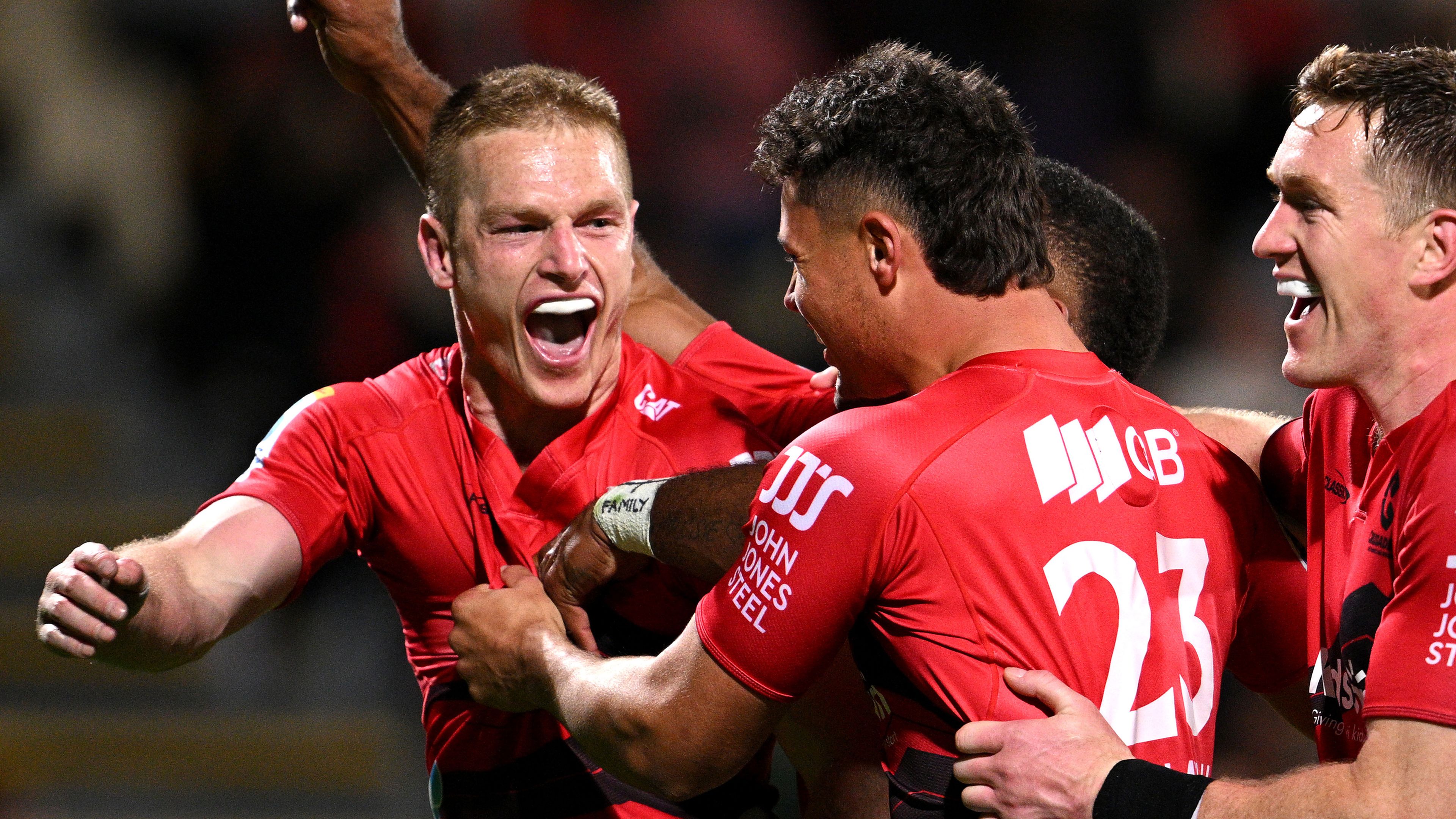 Johnny McNicholl of the Crusaders celebrates after scoring a try during the round six Super Rugby Pacific match between Crusaders and Chiefs.
