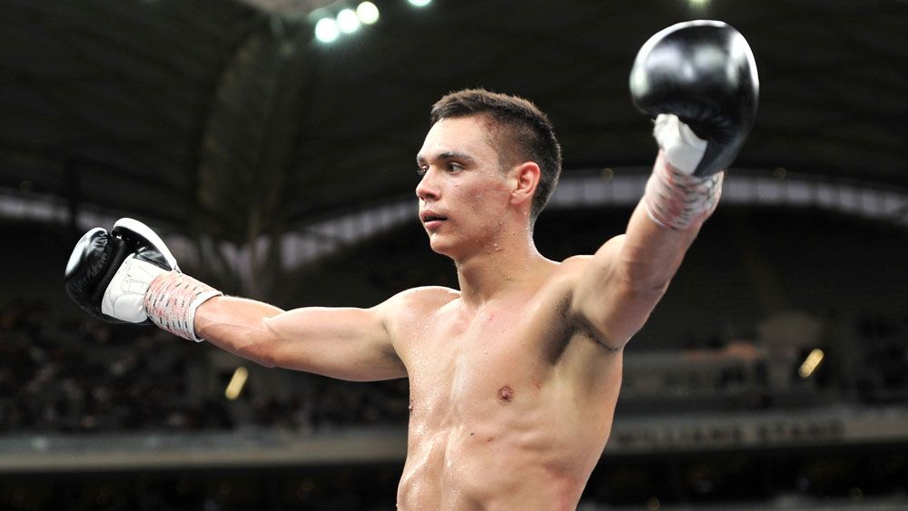 Tim Tszyu recovers from early knockdown to win first professional boxing title