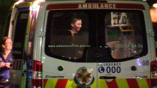 Darcy in the back of an ambulance after their overnight rescue. (9NEWS)