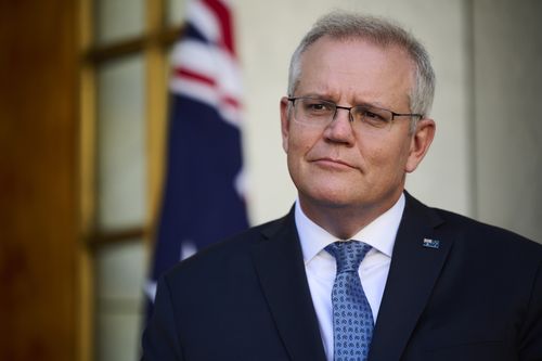CANBERRA, AUSTRALIA - AUGUST 23: Australian Prime Minister Scott Morrison discusses the Government's plan to 'live with the virus' during a press conference at Parliament House. Federal parliament has resumed in Canberra, despite the ACT being in lockdown due to growing COVID-19 cases. NSW and Victoria are also currently in lockdown as health authorities work to contain the spread of the highly contagious Delta strain of the coronavirus. (Photo by Rohan Thomson/Getty Images)