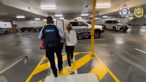 A 31-year-old American woman allegedly had $6.5 million worth of cocaine packed in her suitcase when she landed at Sydney Aiport yesterday.
