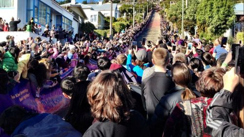 Up to 15,000 onlookers crammed onto the world's steepest street. (Twitter)