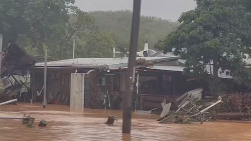 Good Samaritan Gavin Dear said the real hero was helicopter pilot Magoo, who lowered into the flood zone.