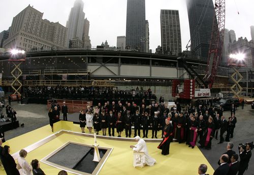 Pope Benedict XVI, centre, kneels in prayer during his visit to ground zero in New York on April 20, 2008. 