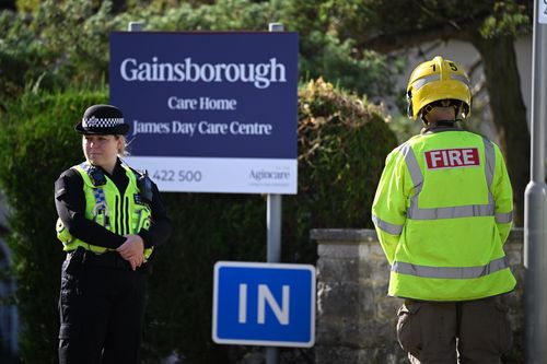 A Police officer stands outside the Gainsborough care home where emergency services attend to an incident on October 23, 2024 in Swanage, England