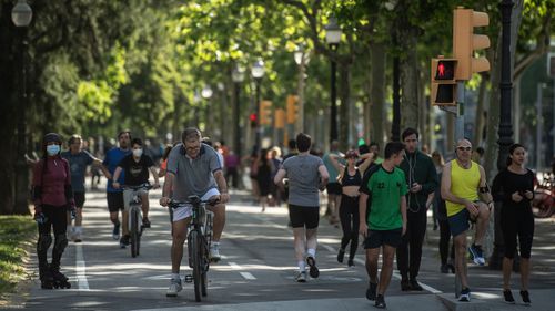 People exercise outdoors on May 02, 2020 in Barcelona, Spain