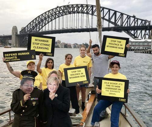 Amnesty International protesters in Sydney Harbour this morning. They want to bring more attention to the plight of Rohingya muslims in Myanmar. Picture: AAP)