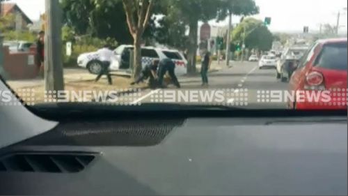 Man arrested outside a Geelong school after reportedly threatening a child