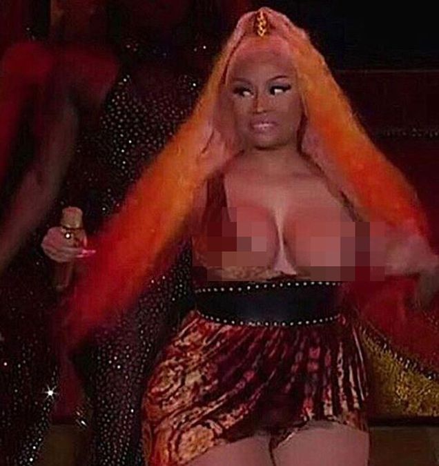 Nicki Minaj performs through wardrobe malformation.