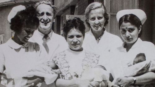 Reg (back right) with his wife Catherine (back left).