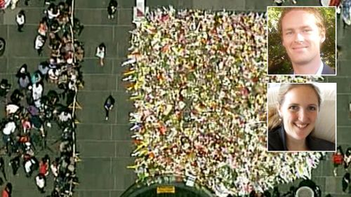 Martin Place has become a sea of flowers for the two victims of the siege, Tori Johnson and Katrina Dawson.