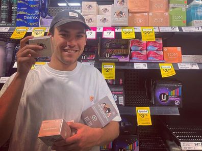 Thomas Burns poses with Femme Organic products in his local Woolies.