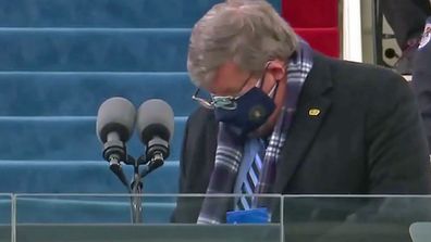 Unidentified podium sanitiser wipes away during Joe Biden's presidential inauguration
