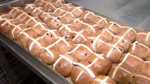 Woolworths and Coles are baking up controversy over the January arrival of the Easter treat. (9NEWS)