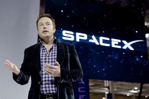 HAWTHORNE-CA-MAY 29: SpaceX CEO Elon Musk unveils the company's new manned spacecraft, The Dragon V2, designed to carry astronauts into space during a news conference on May 29, 2014.