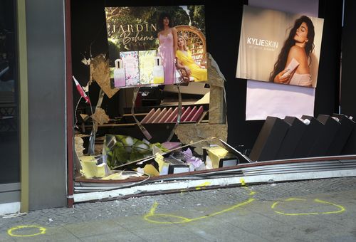 The damaged storefront at the scene of the fatal accident close to the Kaiser Wilhelm Memorial Church is pictured in Berlin, Germany, Thursday, June 9, 2022. 
